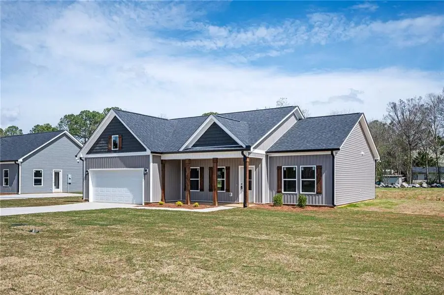 Front exterior of a new home in , Mount Zion, GA, highlighting curb appeal (Image 2). Front exterior of a new home in , Mount Zion, GA, highlighting curb appeal (Image 2).