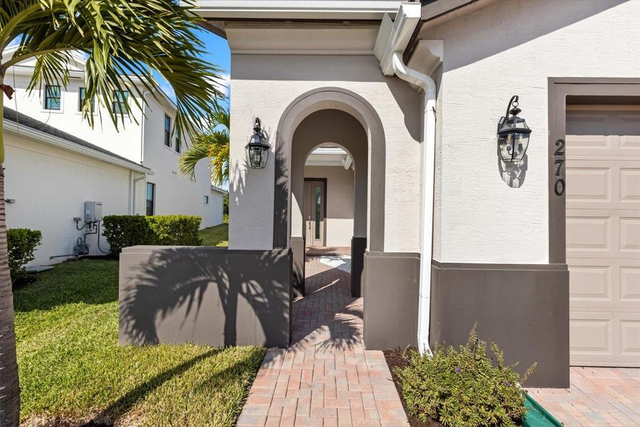 Exterior details and patio area of a home in Tesoro Club, Port St. Lucie (Image 24).