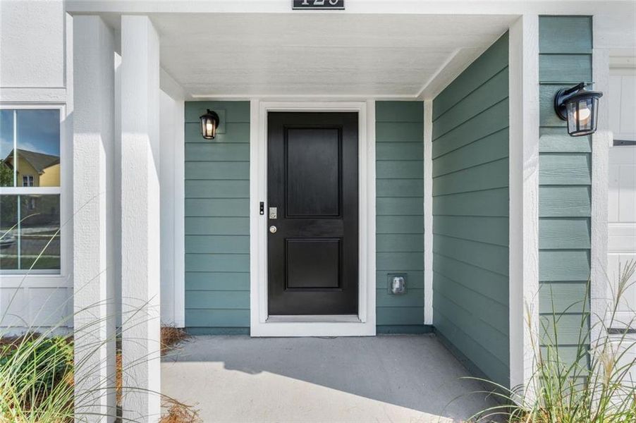 Exterior details and patio area of a home in Twin Lakes, Hoschton (Image 3).