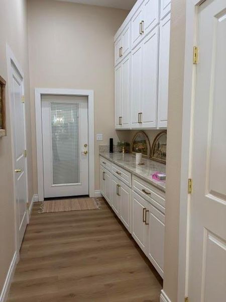 Furnished interior view inside a new home in , El Campo (Image 17).