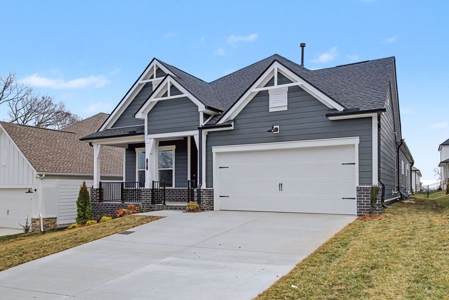 Front exterior of a new home in The Preserve at Five Oaks, Lebanon, TN, highlighting curb appeal (Image 22).