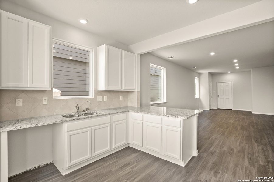 Furnished interior view inside a new home in Abbott Place, St. Hedwig (Image 7).