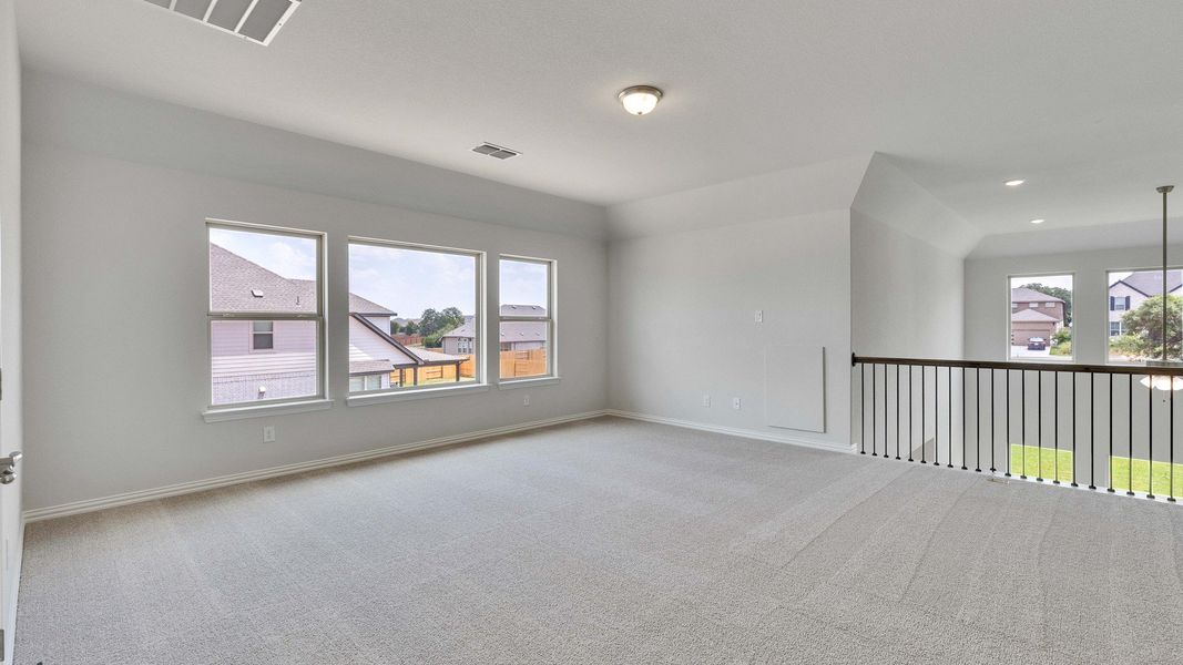 Furnished interior view inside a new home in Oaks at San Gabriel, Georgetown (Image 14).