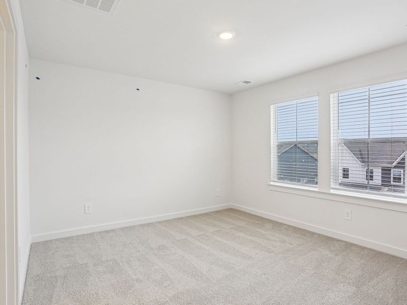 Spacious, unfurnished interior of a new home in Greystone - Highland Townhomes, Smyrna (Image 11).