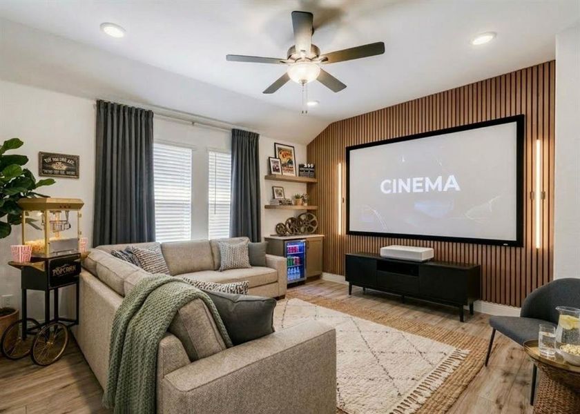 Virtually Staged flex space shown as a media room