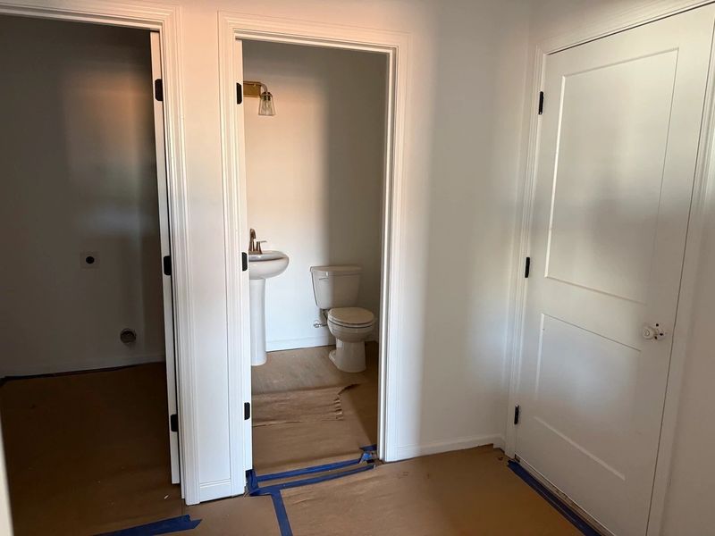 1/2 Bath featuring the AW Collection® Serene - Small, refined space with soft, quiet finishes.