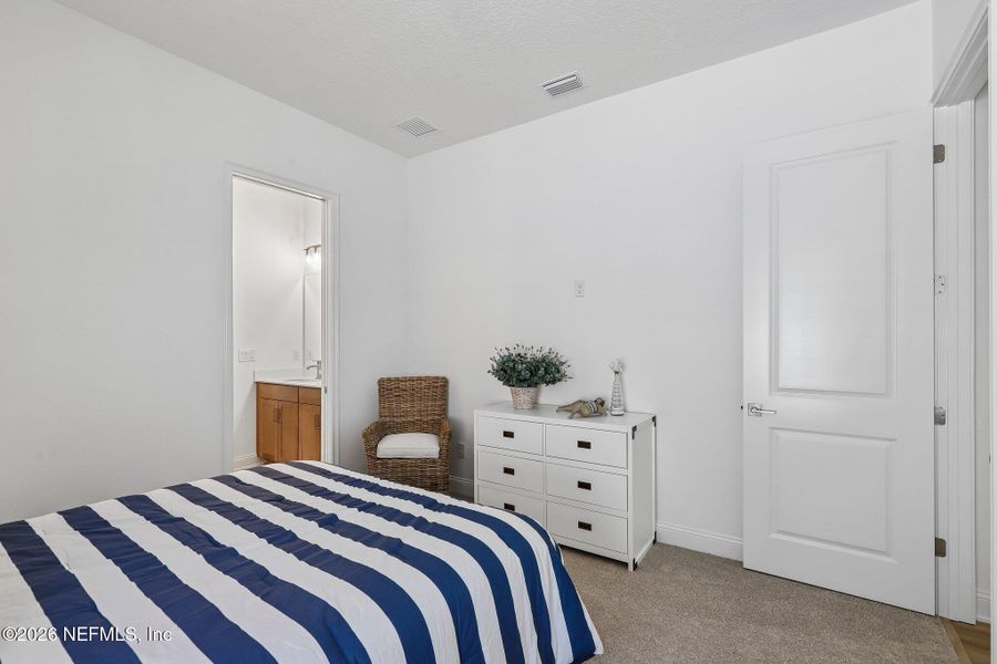 Furnished interior view inside a new home in SilverLeaf, St. Augustine (Image 49).