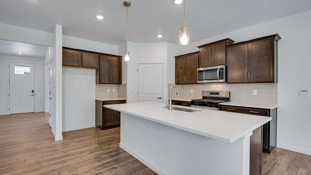 Furnished interior view inside a new home in Trails at Crowfoot, Parker (Image 7).