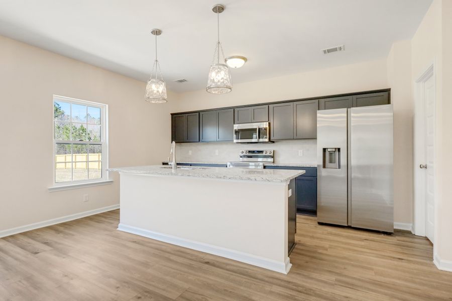 Representative furnished interior of a home built from the The Bagley by RTS Homes in Grand Reserve, Hinesville (Image 5).