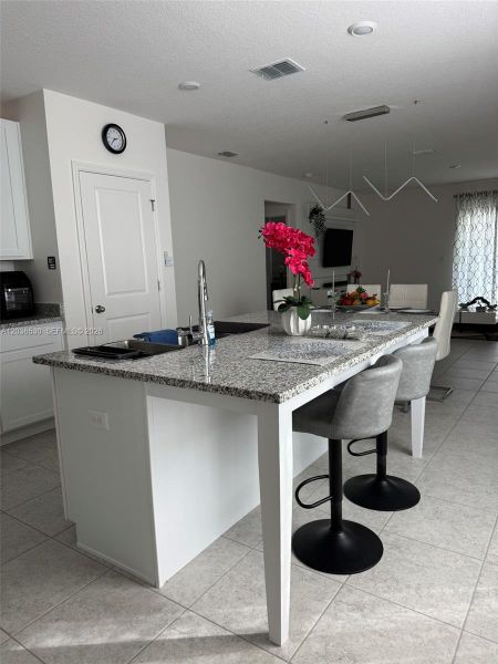 Furnished interior view inside a new home in Hammock Reserve, Haines City (Image 10).
