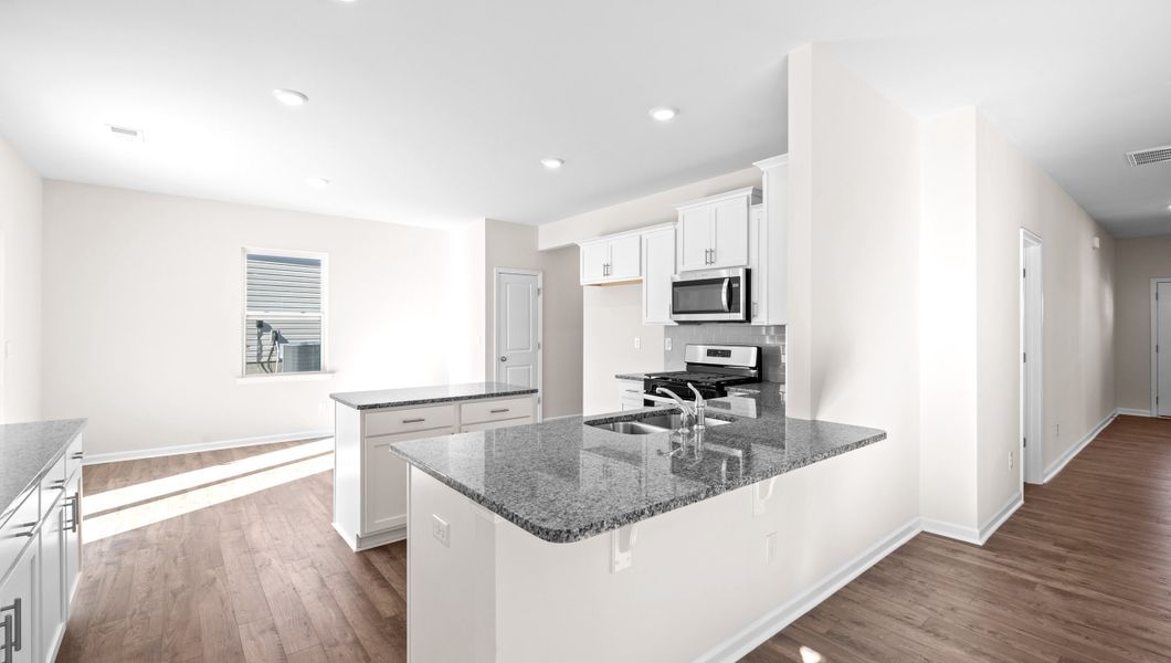 Furnished interior view inside a new home in Hunters Ridge, Woodruff (Image 6).