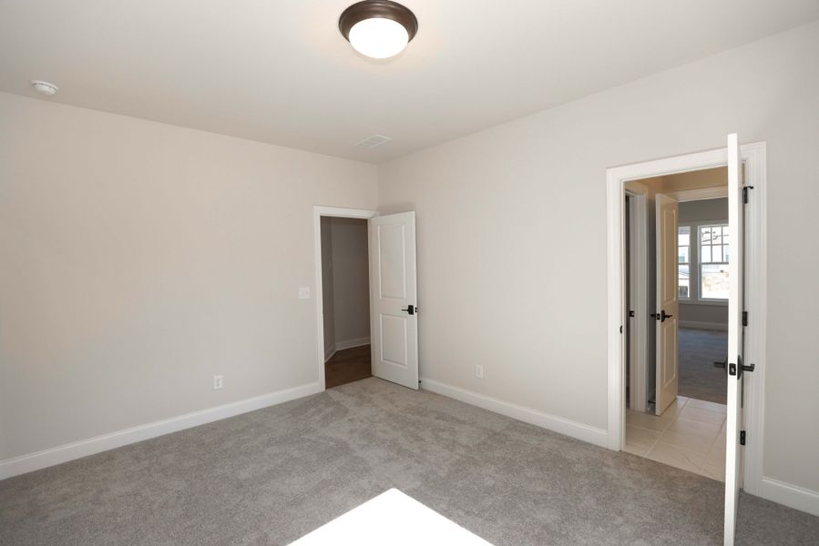 Representative unfurnished interior of a home built from the The Maddox by The Providence Group in Bellmoore Park, Johns Creek (Image 38).