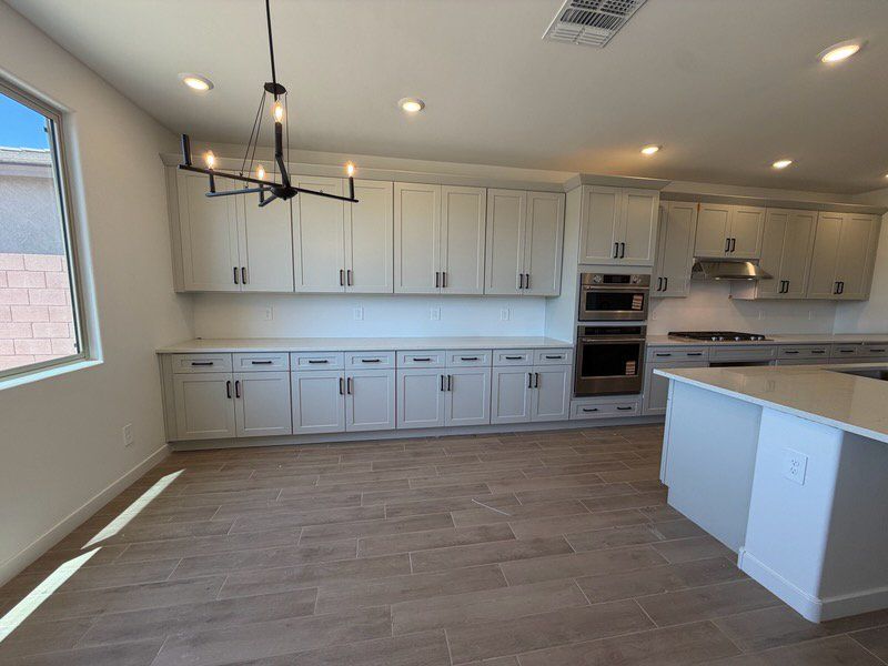 Spacious, unfurnished interior of a new home in Naranja Trails, Oro Valley (Image 6). Spacious, unfurnished interior of a new home in Naranja Trails, Oro Valley (Image 6).