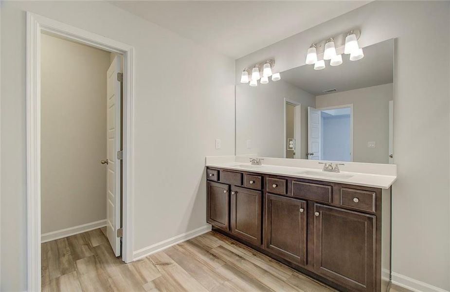 Furnished interior view inside a new home in Crofton Place Enclave, Snellville (Image 13). Furnished interior view inside a new home in Crofton Place Enclave, Snellville (Image 13).