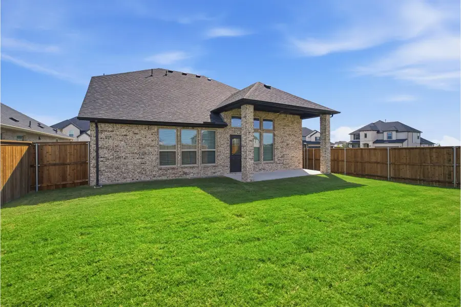 Exterior details and patio area of a home in Green Meadows, Celina (Image 28). Exterior details and patio area of a home in Green Meadows, Celina (Image 28).