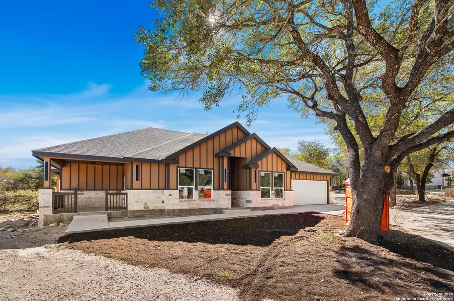 Exterior details and patio area of a home in , Elmendorf (Image 3).