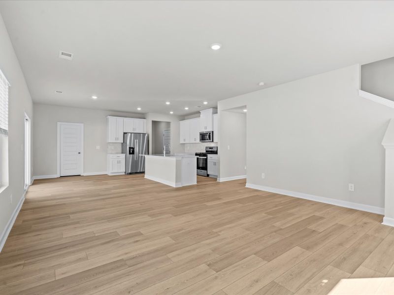 Spacious, unfurnished interior of a new home in The Farm at Wells Creek - Signature Collection, Gray Court (Image 13).