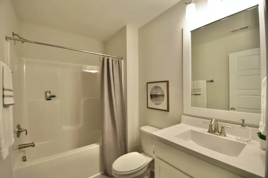 Furnished interior view inside a new home in Patriot’s Watch, Shallotte (Image 13). Furnished interior view inside a new home in Patriot’s Watch, Shallotte (Image 13).