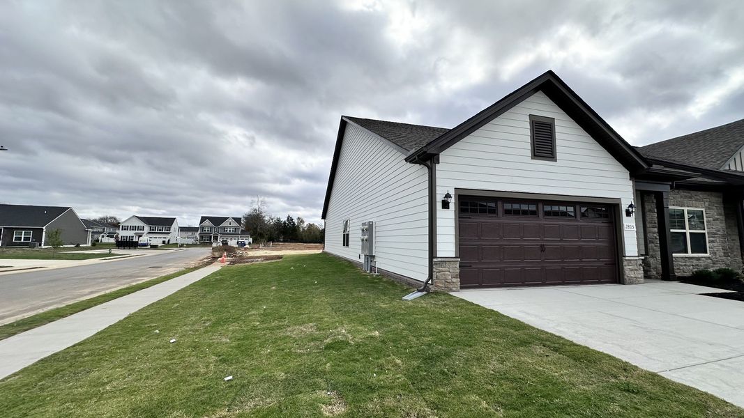 Front exterior of a new home in Veterans Cove, Murfreesboro, TN, highlighting curb appeal (Image 2).