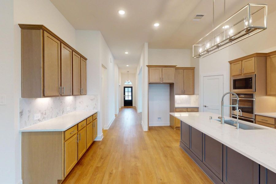 Furnished interior view inside a new home in Sorella, Tomball (Image 5).