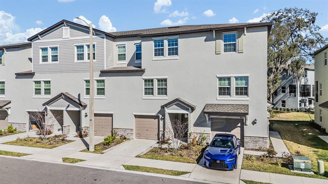 Front exterior of a new home in , Tampa, FL, highlighting curb appeal (Image 28).