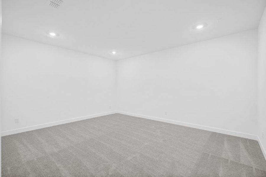 Spacious, unfurnished interior of a new home in Avalon at Friendswood 70s, Friendswood (Image 32).