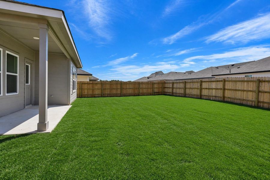 Exterior details and patio area of a home in Emberly, Beasley (Image 2).