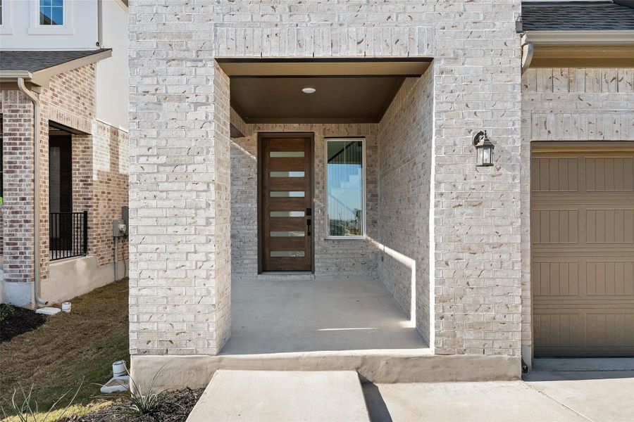 Exterior details and patio area of a home in Flora, Hutto (Image 23).