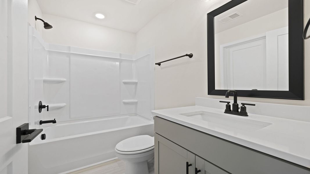 Representative furnished interior of a home built from the BERKSHIRE by D.R. Horton in Sycamore Cove, Woodruff (Image 10).