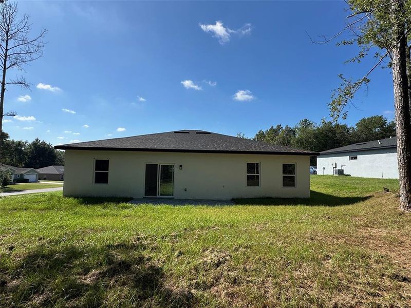 Exterior details and patio area of a home in , Citrus Springs (Image 31).