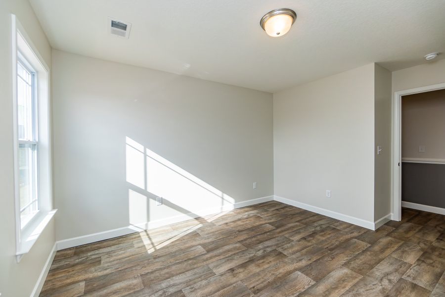 Representative unfurnished interior of a home built from the Clifton by Enchanted Homes in Hampshire Heights, Moore (Image 20).