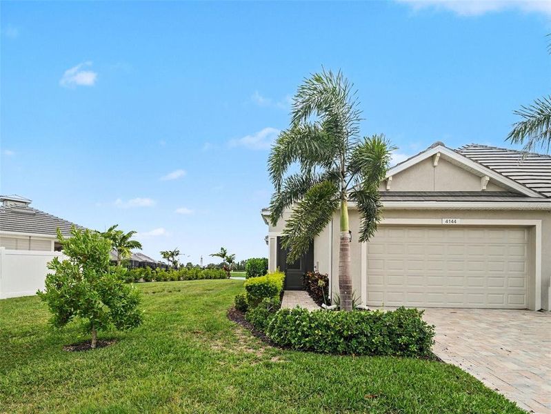 Front exterior of a new home in , Parrish, FL, highlighting curb appeal (Image 16).
