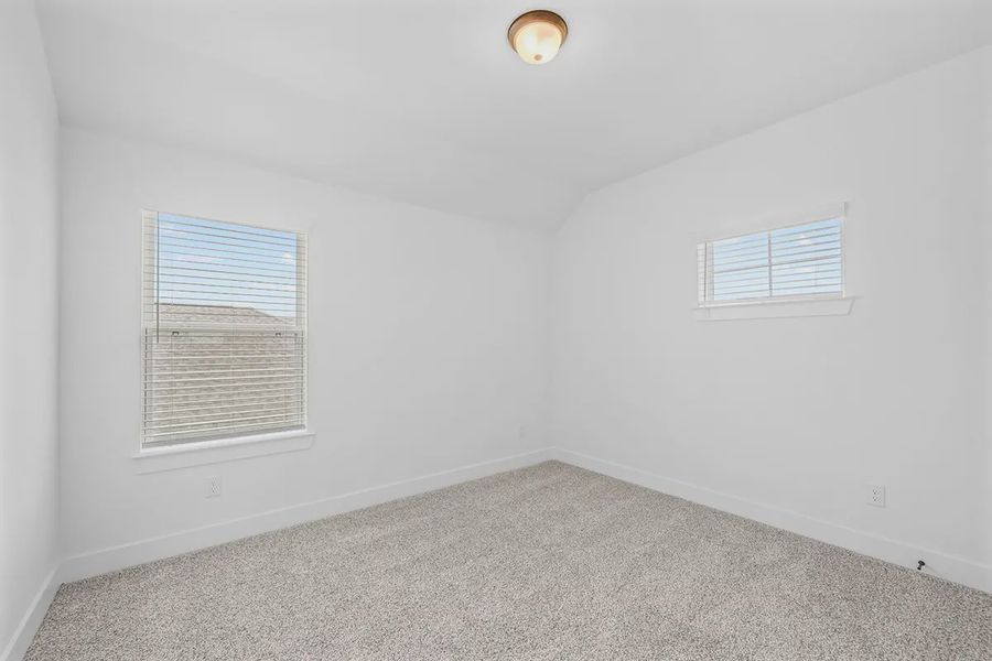 Representative unfurnished interior of a home built from the Madison by Chesmar Homes in Grange, Katy (Image 32).