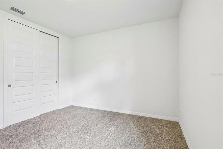 Spacious, unfurnished interior of a new home in The Grove at Stuart Crossing - Signature Series, Bartow (Image 26). Spacious, unfurnished interior of a new home in The Grove at Stuart Crossing - Signature Series, Bartow (Image 26).