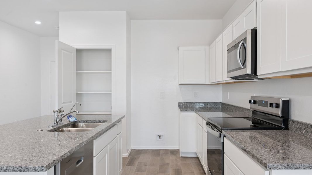 Furnished interior view inside a new home in Magma Ranch Vistas, Florence (Image 7).