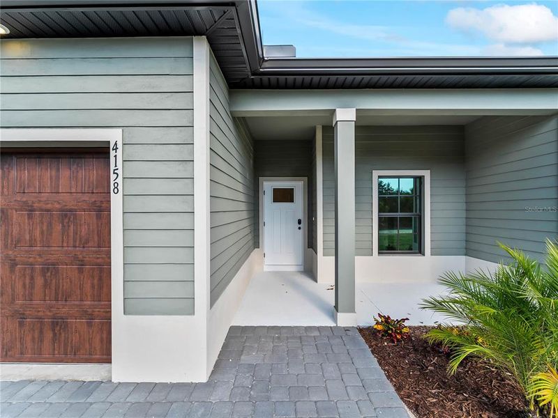 Exterior details and patio area of a home in , North Port (Image 33).