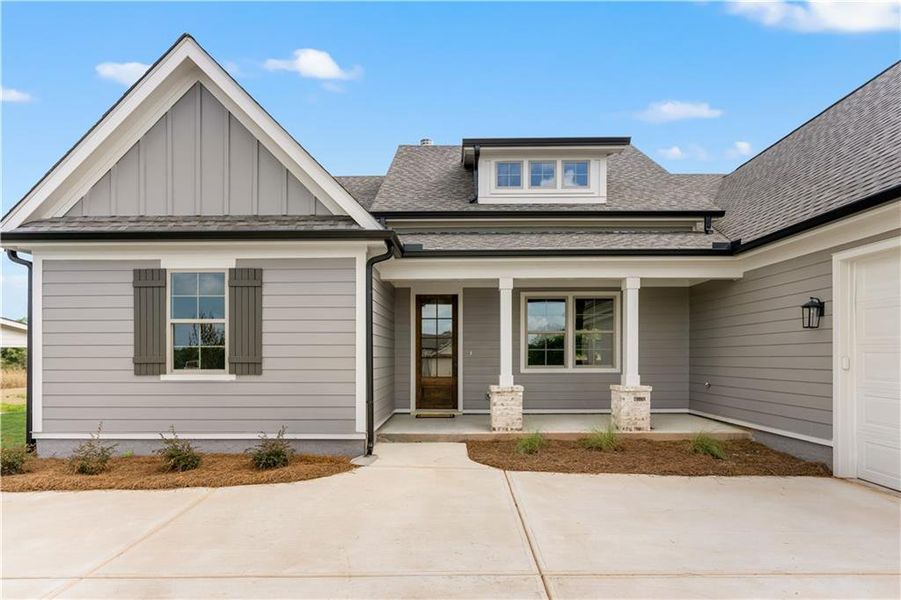 Front exterior of a new home in , Madison, GA, highlighting curb appeal (Image 28). Front exterior of a new home in , Madison, GA, highlighting curb appeal (Image 28).