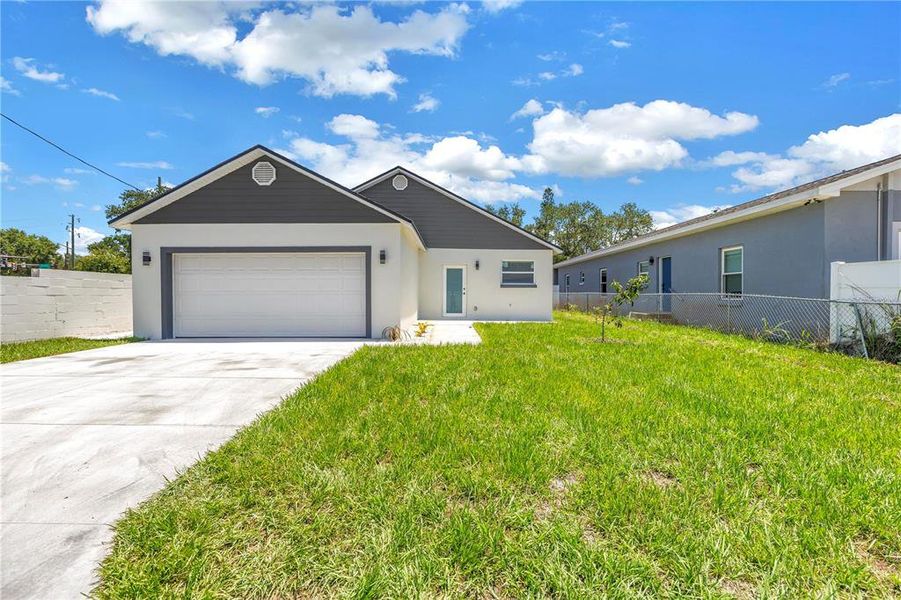 Front exterior of a new home in , St. Petersburg, FL, highlighting curb appeal (Image 18).