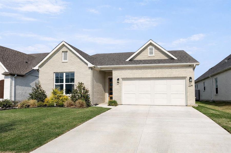 Front exterior of a new home in , Aledo, TX, highlighting curb appeal (Image 22).