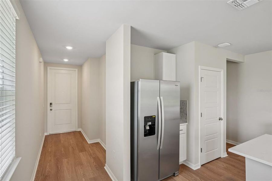 Furnished interior view inside a new home in Crescent Lakes - Premier Series, Punta Gorda (Image 5).