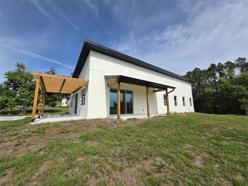 Exterior details and patio area of a home in , Morriston (Image 18).