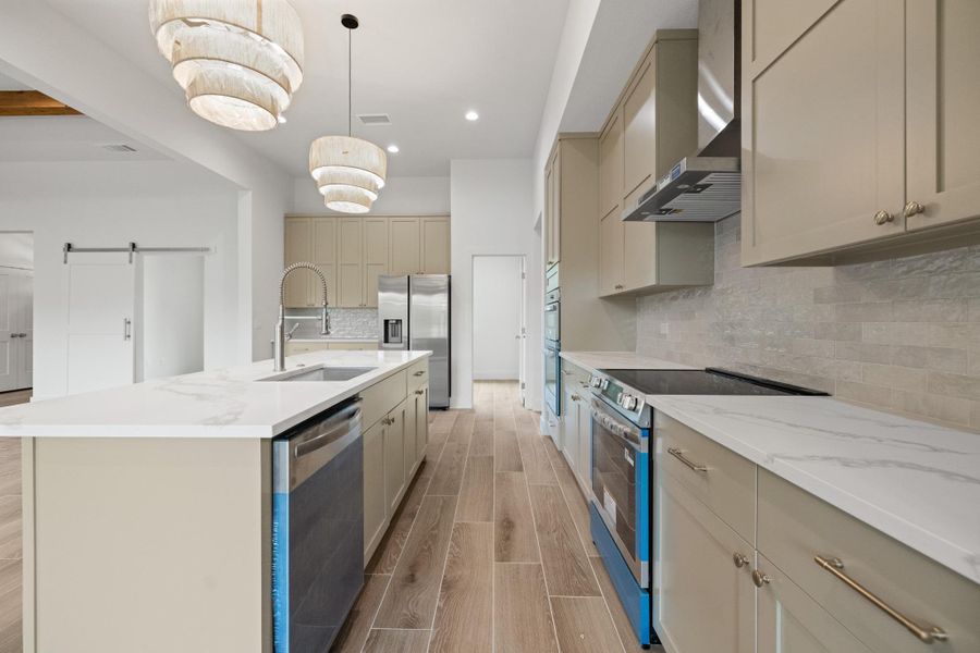 A amazing kitchen showcasing sleek appliances and a spacious island, perfect for entertaining.