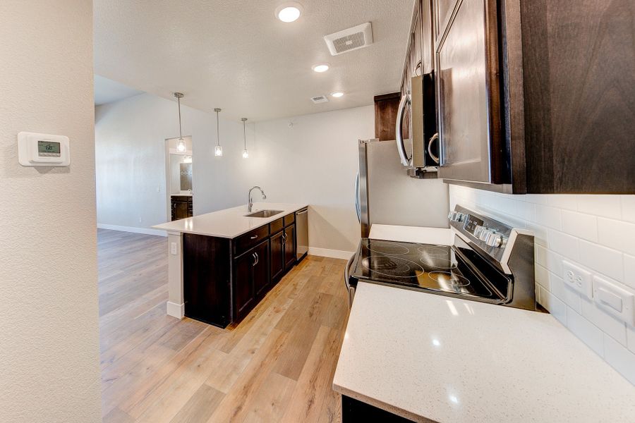 Representative furnished interior of a home built from the The Vanderbilt by Landmark Homes in Highlands at Fox Hill, Longmont (Image 2). Representative furnished interior of a home built from the The Vanderbilt by Landmark Homes in Highlands at Fox Hill, Longmont (Image 2).