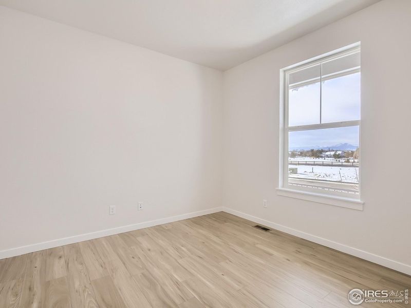 Spacious, unfurnished interior of a new home in RainDance, Windsor (Image 14).