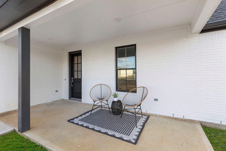 Exterior details and patio area of a home in , Brenham (Image 4).