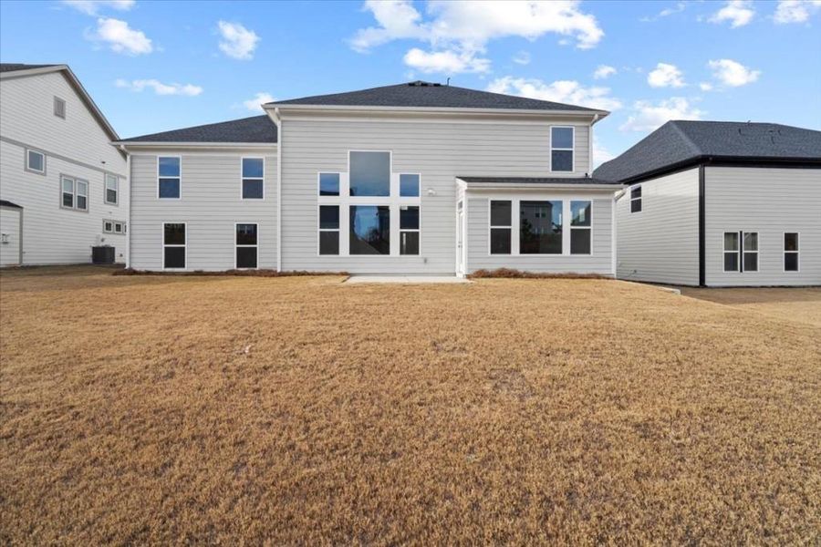 Exterior details and patio area of a home in Twin Lakes, Hoschton (Image 3).
