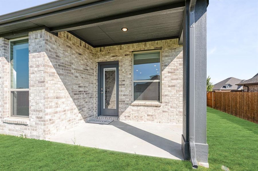 Exterior details and patio area of a home in The Grove, Midlothian (Image 3). Exterior details and patio area of a home in The Grove, Midlothian (Image 3).