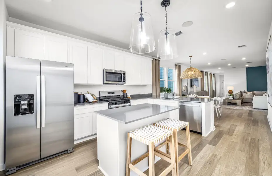 Representative furnished interior of a home built from the Afton by Pulte Homes in Saddleback at Santa Rita Ranch, Liberty Hill (Image 5).