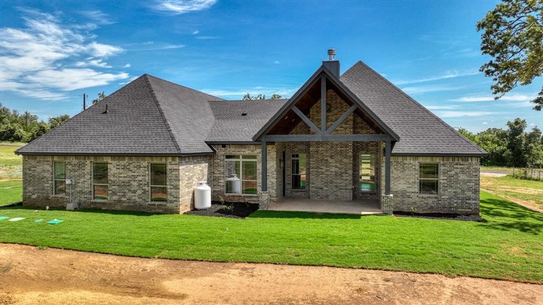 Front exterior of a new home in , Weatherford, TX, highlighting curb appeal (Image 1). Front exterior of a new home in , Weatherford, TX, highlighting curb appeal (Image 1).