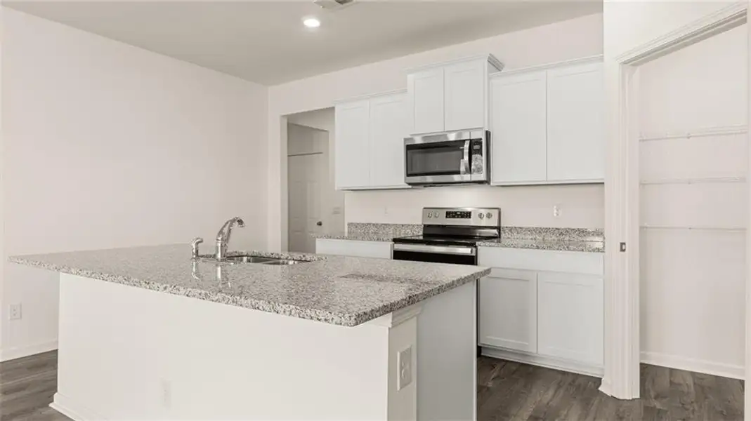 Furnished interior view inside a new home in Oakchase at Hampton, Hampton (Image 8).